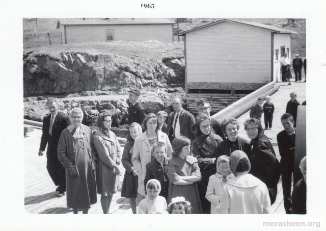 On the government wharf with freight shed in back in 1965.&amp;nbsp; Some of the familiar faces include, from the left, Jack Barry, Mrs. Casey, Stella Wilson, Dick Ennis, Bertha Wilson, Theresa Fulford, Martin Connors, Tobias Pearson, Lucy Ennis, Betty Ennis, Carmelita Barry, MaryAnn Ennis&amp;nbsp;