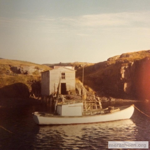 Circa 1970, Johnny Barnett's skiff in front of Johnny Ennis' stage.&amp;nbsp; Photo credit: Carl Pitcher
