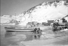 Breaking ice in the harbour in front of Jim Connors' wharf.&amp;nbsp; Jim built that boat and there's another on the wharf.&amp;nbsp;&amp;nbsp;In the distance are Tom and Charlie Pittman's houses.