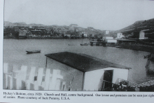 50 The Church in the far background and the caption on the photo identifies a Hall in 1920 which was later used as the Co-op store and the school remained on the second floor. John Louis Ennis’s, Ernie’s grandfather’s house and premises can be seen just to the right and centre. We can also see Canning’s Twine Loft in the foreground while it is Bernard Canning’s flake with fish drying at the bottom right corner; Martin Conner’s stage wharf is off to the left on Soldier’s Point. The two flakes and sheep house are on Mr. Pittman’s premises at the bottom centre of the inlet.