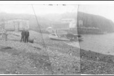 57 A foggy view of Wilson's beach between Johnny Wilson's house on the left and George Wilson's stage on the right.
